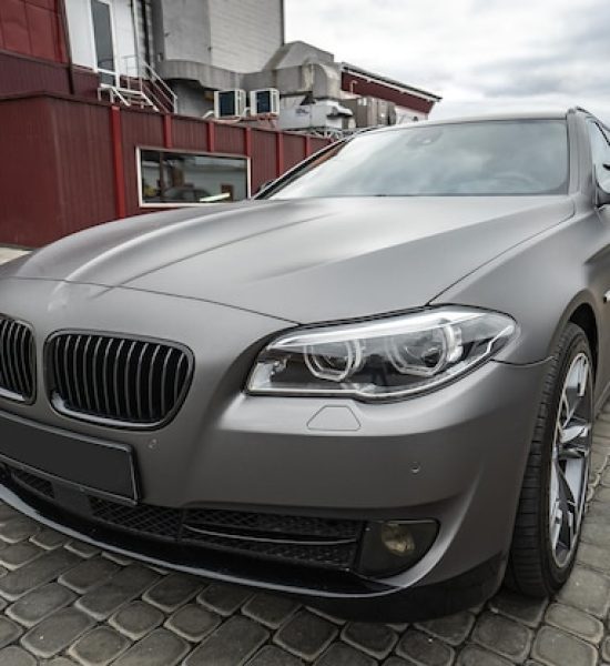 https://img.freepik.com/premium-photo/predatory-car-headlight-with-blue-lights-hood-powerful-grey-blue-car-sports-car-with-matte-grey-paint-wheel-with-blue-disc_308547-3156.jpg